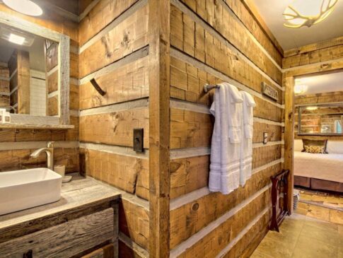 Appalachia bathroom with basin sink and bedroom in backgrond