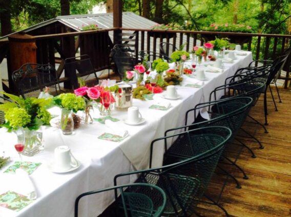 table set with flowers on deck