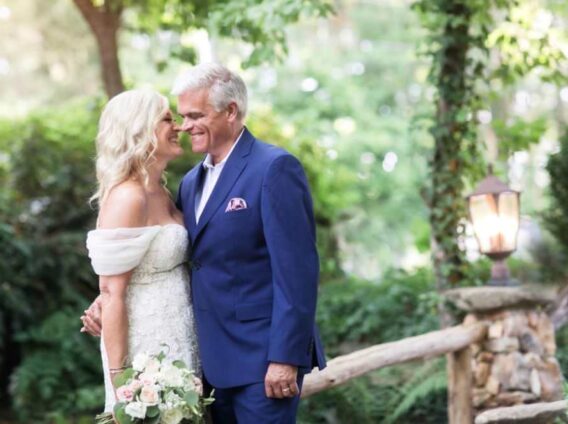 smiling bride and groom