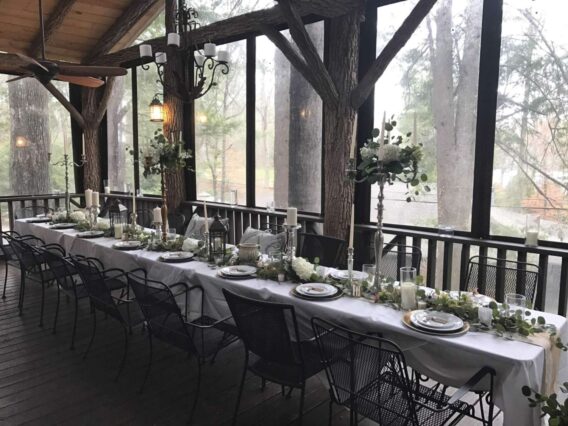table set with flowers on deck